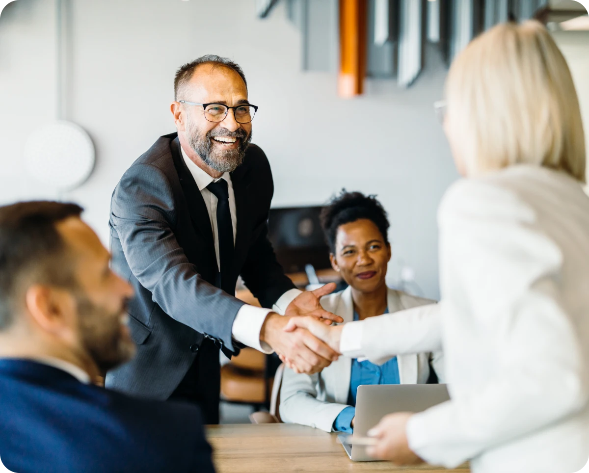 Professional handshake during office meeting